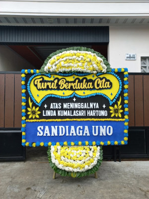 Papan Bunga Duka di Parak Batuang