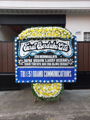 Papan Bunga Duka di Parak Batuang